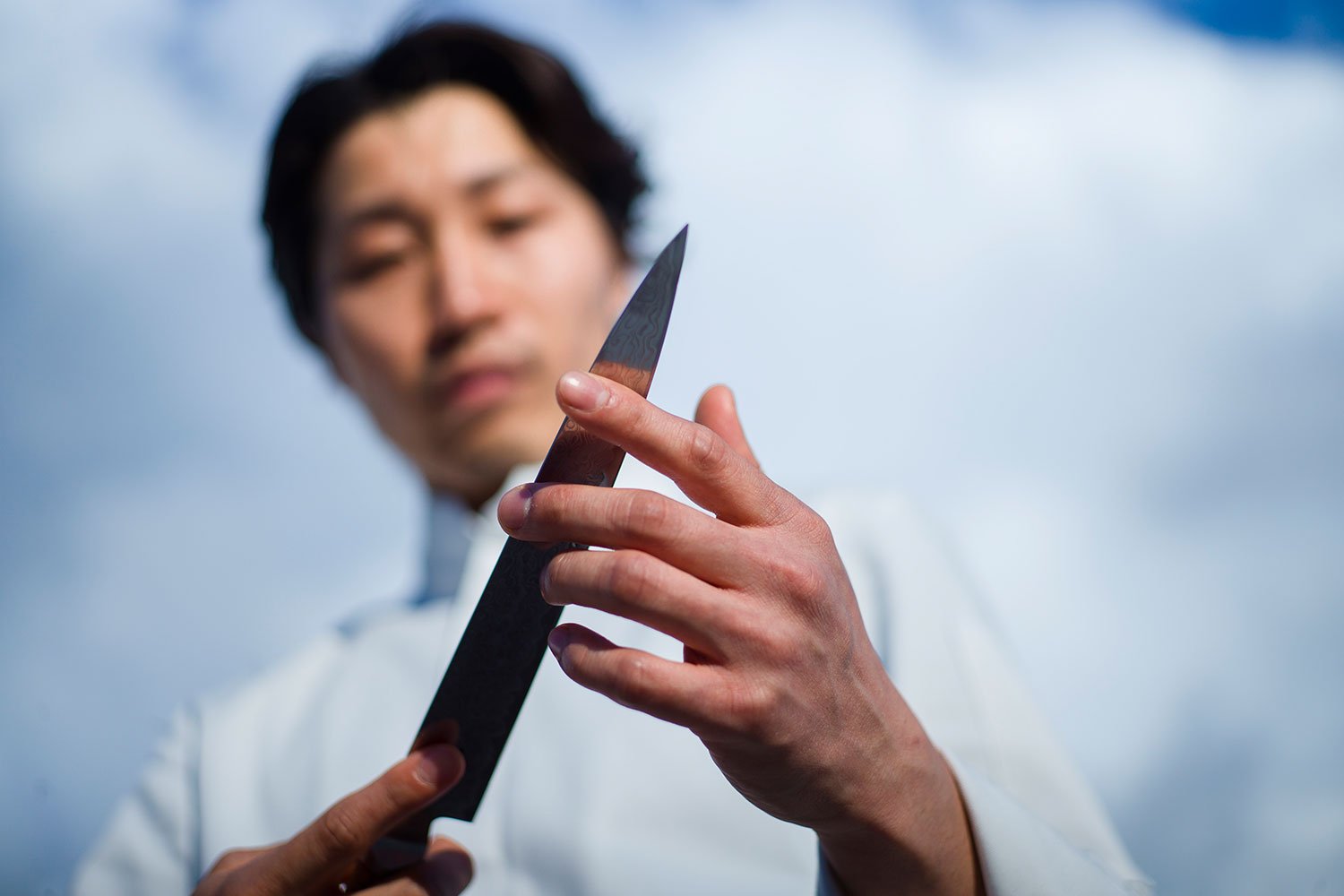 Chef preparing sushi with focus on trust and timing