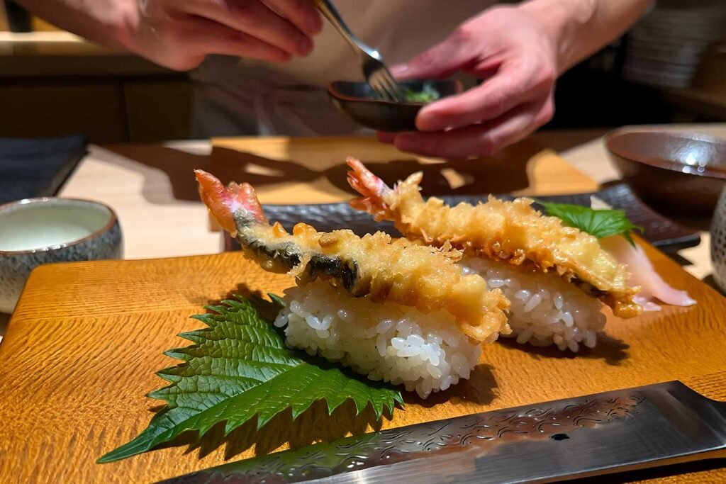 Chef preparing sushi for private omakase dining